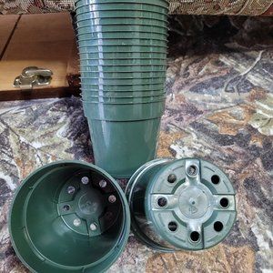 20 GREEN PLASTIC FLOWER POTS MEASURE 4 INCHES X 3.5 INCHES. BRAND NEW